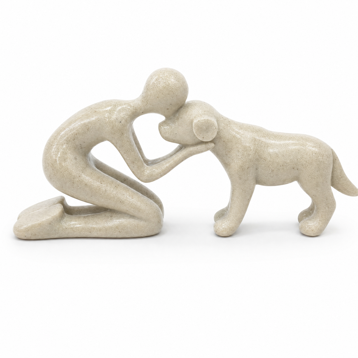 Gentle Moment Statue: a kneeling person hugging a dog, speckled sand finish