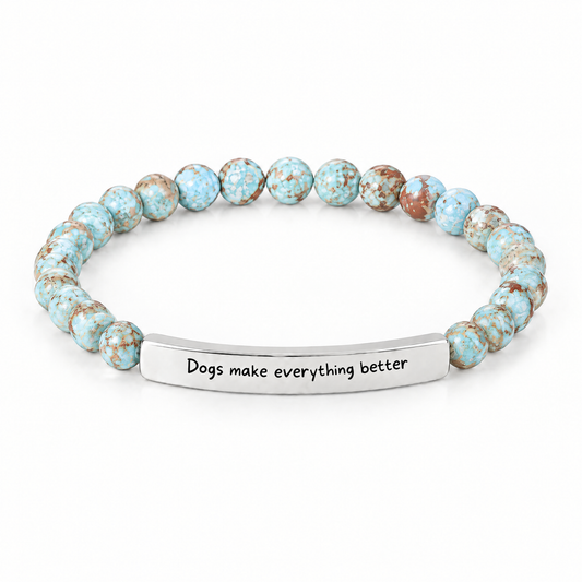 Dogs Make Everything Better Bracelet (Lagoon): light aqua blue beads with a silver-tone bar that reads "Dogs make everything better"