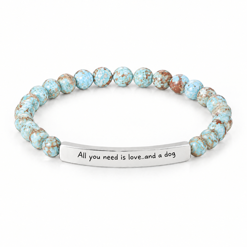 All You Need Is Love and a Dog Bracelet (Lagoon): light aqua blue beads with a silver-tone bar that reads "All you need is love..and a dog"