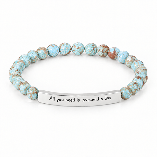 All You Need Is Love and a Dog Bracelet (Lagoon): light aqua blue beads with a silver-tone bar that reads "All you need is love..and a dog"