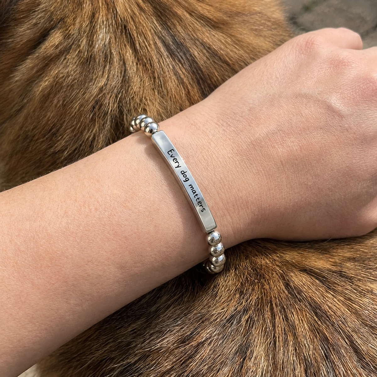 Every Dog Matters Bracelet (Silver-Tone) worn on the wrist